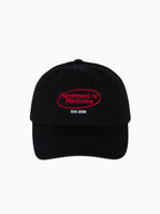 Movement is Medicine Cap in black with red embroidered logo, front view