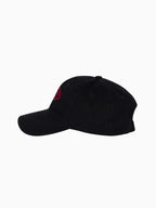 Movement is Medicine Cap in black, side profile