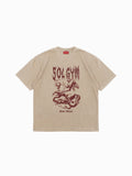 Beige t-shirt with red graphic design and 'SOLGYM' text on a white background