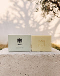 Aquilux Organic Olive Oil Sol Soap bar on a natural surface