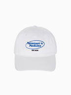 Movement is Medicine Cap in white with blue embroidered logo, front view